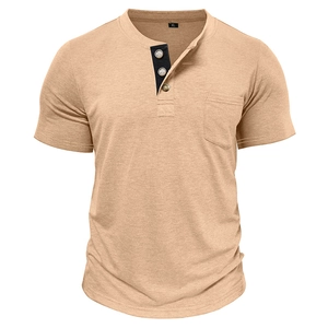 Detail of light brown Henley shirt showing three-button placket and chest pocket texture