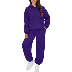 Detail of a dark purple two-piece women's tracksuit with drawstring hoodie and jogger pants