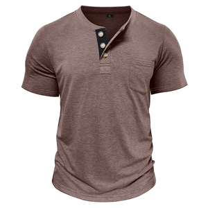 Detail of three-button Henley collar and chest pocket on men's short sleeve shirt