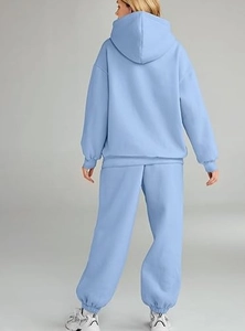 Back view of light blue women's oversized hoodie and joggers lounge set