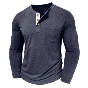 Detail of navy henley shirt with three-button placket and white interior contrast