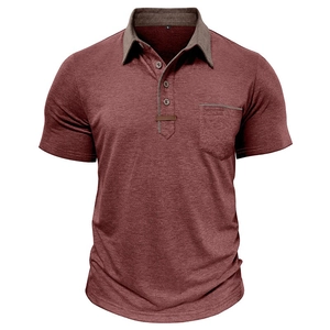 Detail of burgundy polo shirt with grey contrast collar and buttoned chest pocket