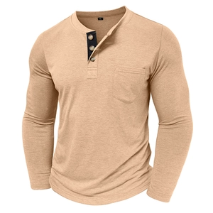Close-up of khaki Henley shirt neckline with three buttons and chest pocket detail