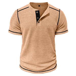 Close-up of waffle knit texture and black contrast piping on men's camel Henley shirt