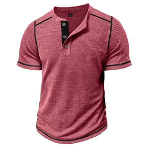 Detailed view of burgundy waffle knit Henley shirt with black contrast stitching and buttons