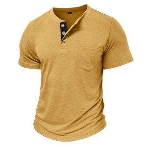 Detail of mustard yellow knit Henley shirt with button placket and contrast chest pocket