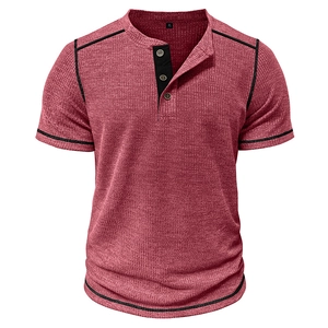 Detail of waffle knit Henley collar with three buttons and black contrast stitching on red tee