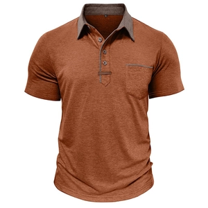 Detail view of men's polo shirt featuring a contrast collar and a chest pocket detail
