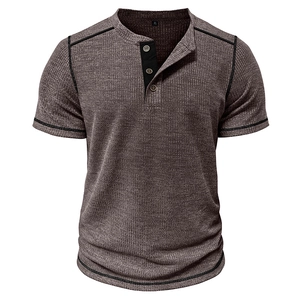 Close-up of waffle texture fabric and contrast stitching on a men's Henley shirt