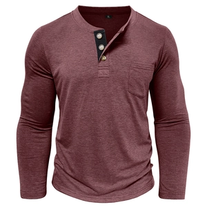 Detailed close-up of a burgundy Henley shirt with three buttons and a chest pocket