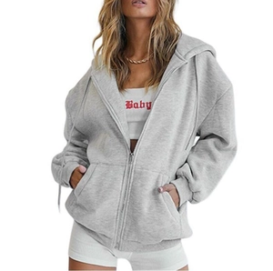 Oversized light grey zip-up hoodie for women featuring a drawstring hood and front pockets
