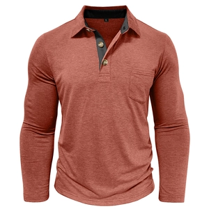 Detail of rust red polo shirt showing knit texture, chest pocket, and three-button placket