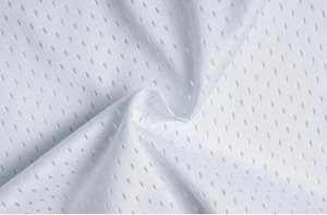 Close-up detail of white quick-dry mesh fabric with breathable micro-diamond texture