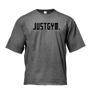 Detail of moisture-wicking dark gray gym t-shirt with black JUSTGYM print and knit texture