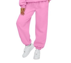 Detail of hot pink joggers with drawstring waist and ribbed cuffs for women
