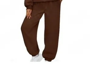 Close-up of high-waisted dark brown jogger pants with ribbed cuffs and loose fit