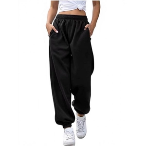 Women's black high-waisted jogging pants with drawstring and ribbed cuffs for sports