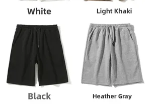 Detail view of cotton sweat shorts in white, light khaki, black, and heather grey tones