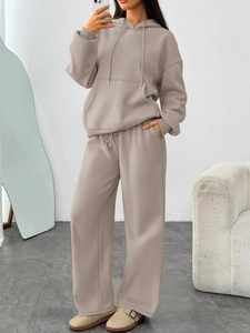 Detailed texture of women hooded fleece tracksuit with wide leg pants in light khaki