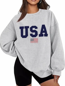 Detail of grey crewneck sweatshirt featuring navy USA letters and American flag print