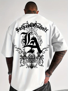 Close-up of the back graphic print with gothic LA lettering on a white streetwear tee