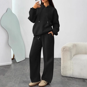 Women's black oversized hoodie and wide-leg sweatpants set for casual sporty fashion