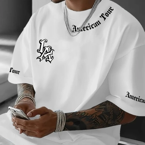 Detail of gothic letters on white oversized t-shirt neckline and LA chest logo