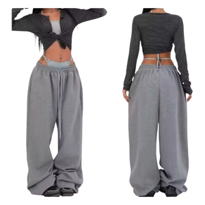Front and back view of grey wide-leg lounge pants with striped cardigan in Y2K street style