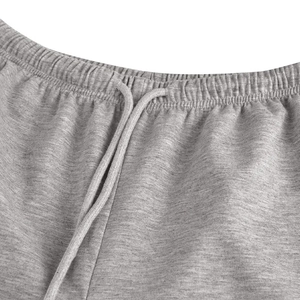 Detail of grey heather high waist trousers featuring elastic waistband and adjustable drawstrings