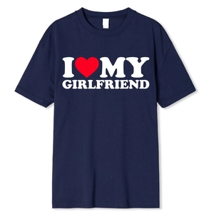Close-up of I Love My Girlfriend text and red heart print on dark blue t-shirt