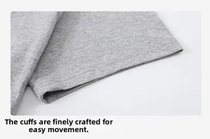 Detailed close-up showing the precise double-needle stitching on the grey cotton T-shirt cuff