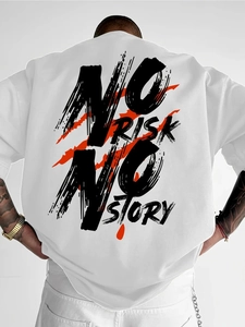 Macro view of white cotton T-shirt back featuring NO RISK NO STORY graffiti print