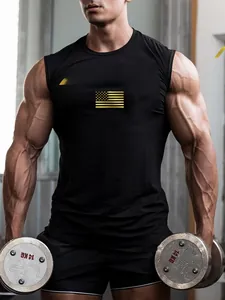 Close-up of men's black gym tank top with gold Alpha logo and star pattern detail