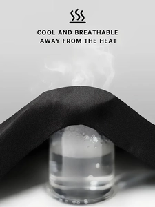 Close-up of black breathable cotton fabric showing high ventilation for sports vests
