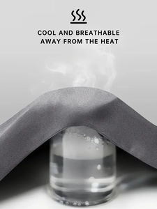 Detailed view of grey functional cotton fabric showing breathability and cool steam relief