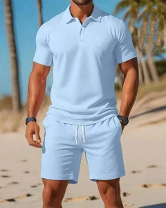 Close-up of men's light blue polo set featuring breathable knit texture and drawstring detail