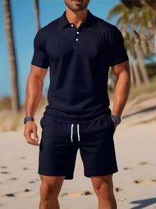 Men's summer black polo shirt and drawstring shorts set on a sunny beach background