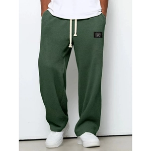 Pantaloni sportivi da uomo verde scuro in maglia a nido d'ape con coulisse e gamba dritta