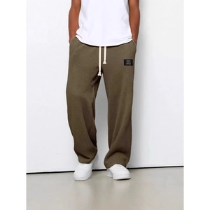 Pantaloni da uomo verde oliva in maglia a nido d'ape con vita elastica a coulisse