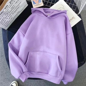 Detail of light purple oversized hoodie with kangaroo pocket and ribbed cuffs in a flat lay