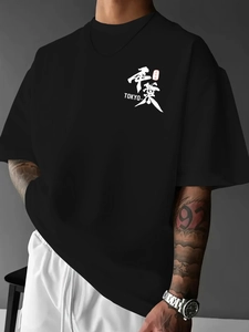Detail of black cotton hip-hop T-shirt with Tokyo Chiba print and dropped shoulder cut