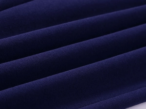 Detailed close-up of dark purple fleece lining texture on the oversized hoodie