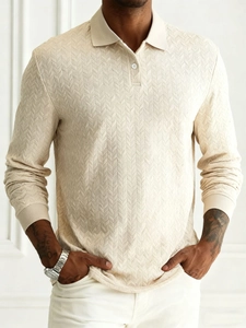 Close-up of the beige long-sleeve Polo shirt showing detailed chevron knit texture