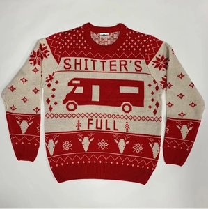 Close-up of ribbed crewneck and jacquard knit classic RV pattern on Christmas sweater