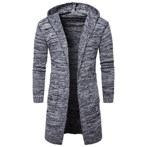 Detail view of heather gray knit cardigan featuring textured fabric and front pockets