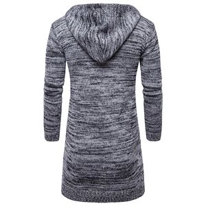 Rear view of grey knit cardigan showing thick cable pattern and integrated hood