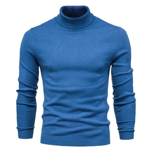 Close-up of royal blue slim fit men's turtleneck knit sweater with ribbed cuffs