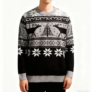 Détail d'un pull en tricot pour hommes avec motifs de rennes et poignets côtelés