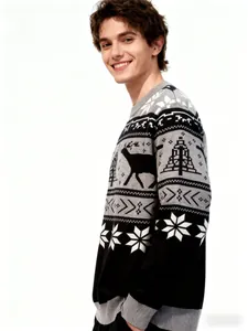 Détail du pull en tricot avec des motifs de rennes et des textures de flocons de neige