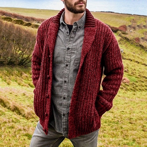 Close-up of men's burgundy shawl collar cardigan sweater in thick ribbed knit texture